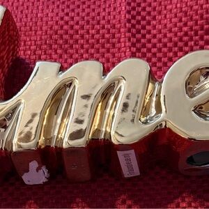 Gold and Red Decorative Sign